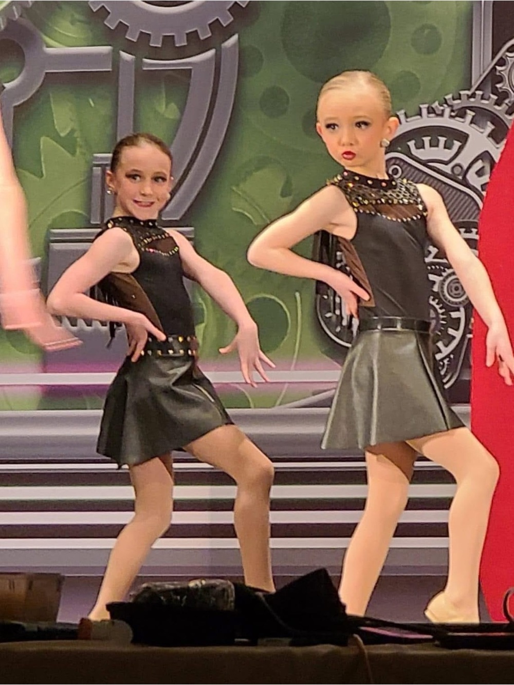Girls Black Faux Leather Dance Dress with Studded Neckline